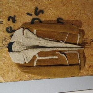 Size small sheep skin jacket brown and white